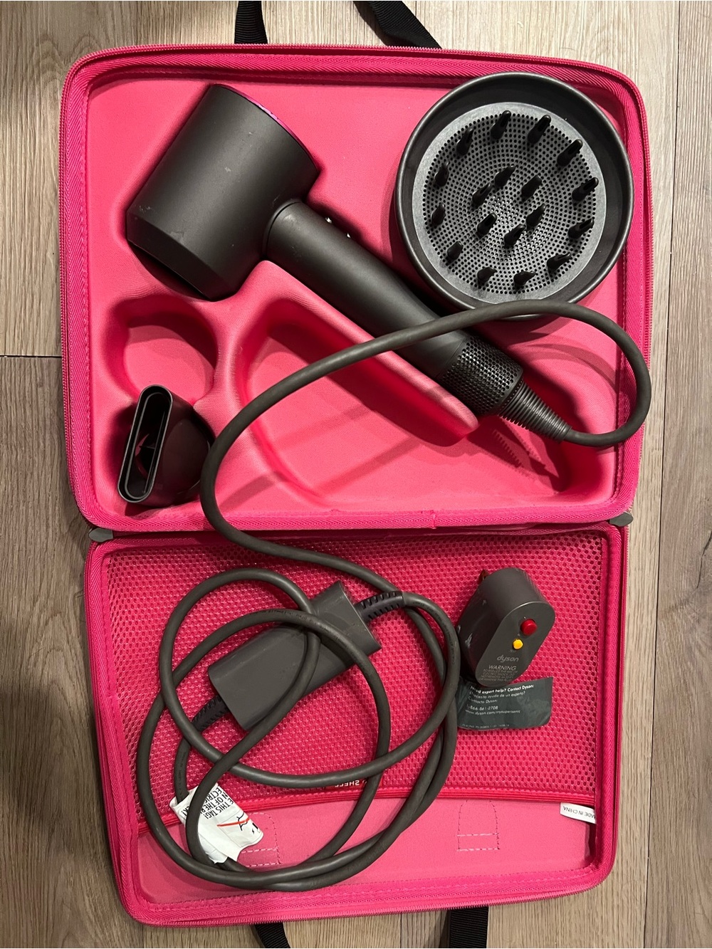 Dyson charcoal and pink travel case hair dryer with attachments